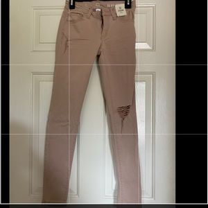 Pale Pink Distressed Skinny Jeans